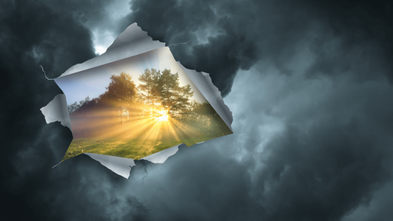 Light breaking through dark clouds
