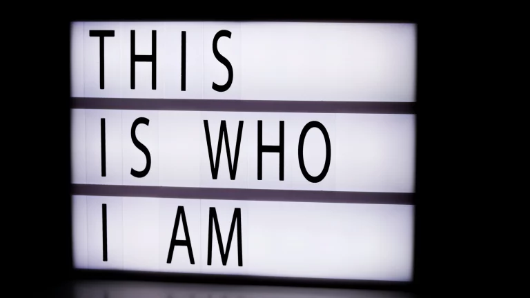Lightbox sign reading “This is who I am,” representing authenticity, self-awareness, and being true to yourself.